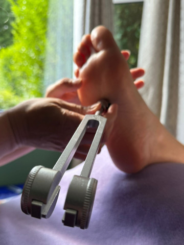 Carolyn sound and tuning fork reflexology