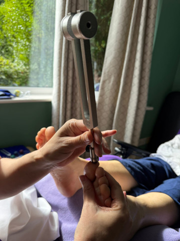 Carolyn sound and tuning fork reflexology